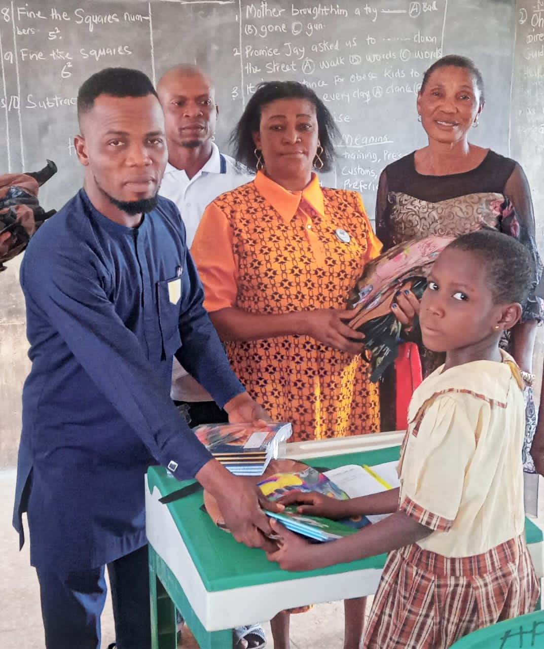 Hon-Charles-Aniagwu-Hon-Chijindu-and-some-PDP-executives-and-some-teachers-of-Umuocha-primary-school-flanked-by-some-pupils-displaying-d-bags-and-exercise-books CHIJINDU DISTRIBUTES SCHOOL BAGS, EDUCATION MATERIALS TO PUPILS